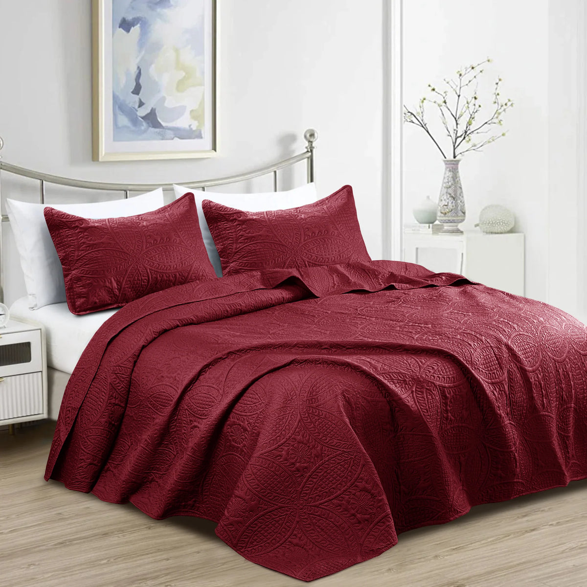Burgundy quilt bedding set with embossed floral coin pattern for bedroom decor