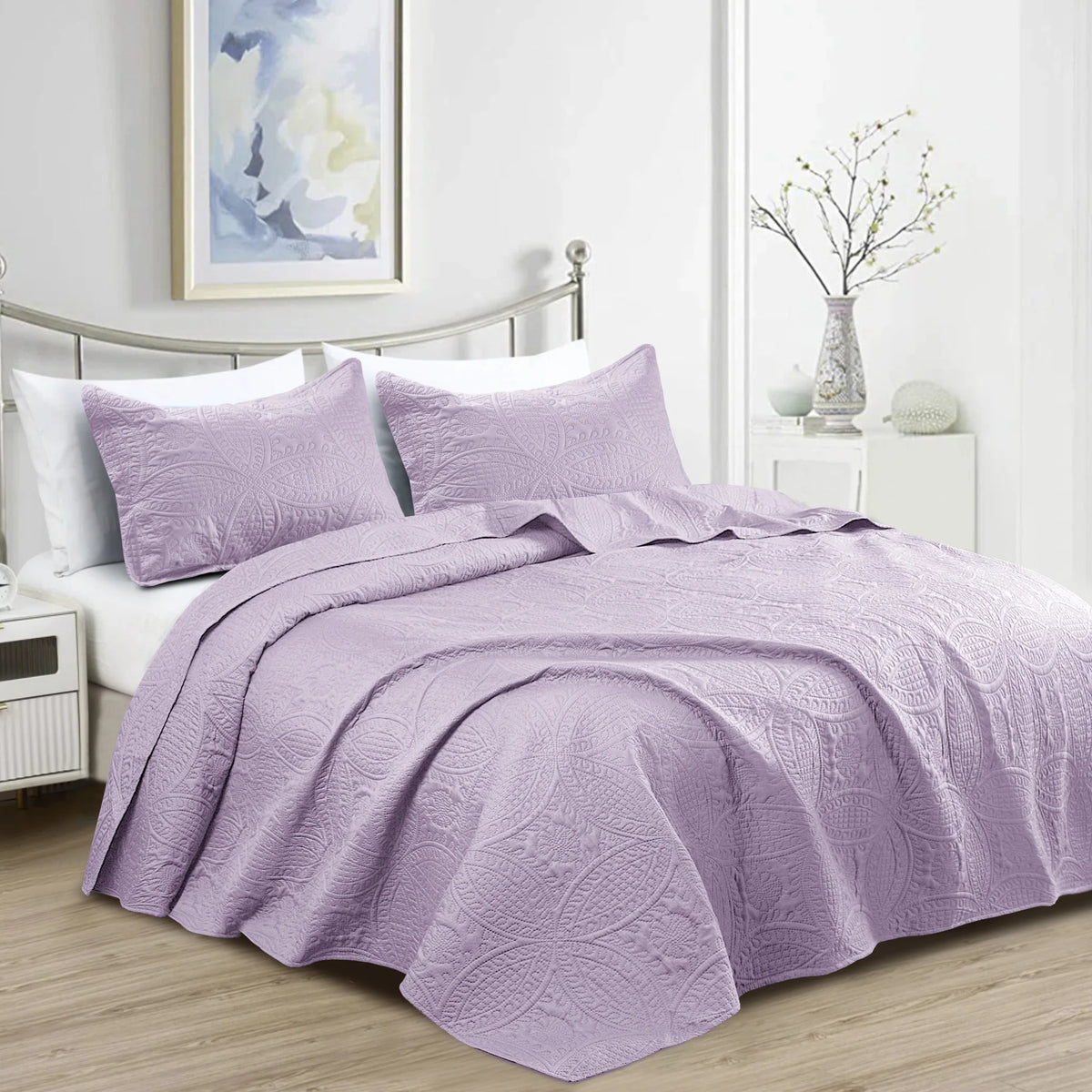 Lavender quilted bedspread set with matching pillowcases and embossed coin design